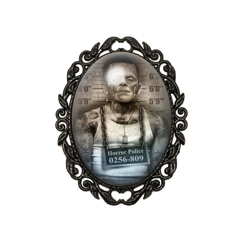 Broche Noire avec Cabochon en Verre Frankestein Coupable